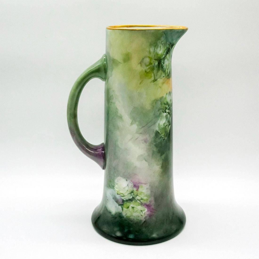 Jean Pouyat Limoges Porcelain Tall Tankard: Hand-painted beer hops and gilded gold rim. Jean Pouyat Limoges backstamp. Issued: 1890-1902 Dimensions: 6.5" L x 11" H x 5.5" Diameter Manufacturer: Jean Pouyat Limoges Country of Origin: France This