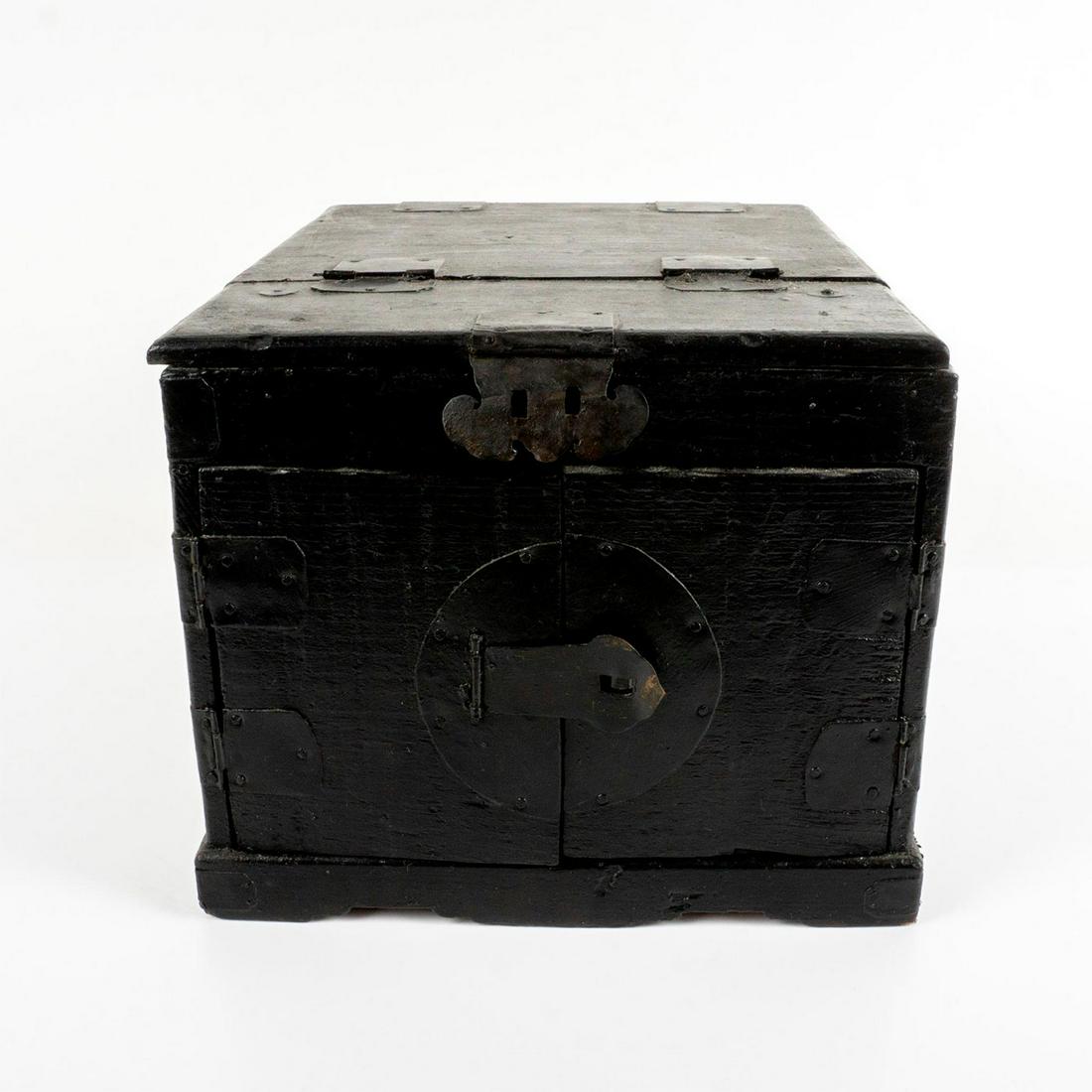 Antique Wooden Chinese Jewelry Box: Black painted box with black metal latches; double doors to revel 4-drawers, and a hidden mirror underneath a top lid. Dimensions: 13" L x 10" W x 8.25" H This item has no reserve.