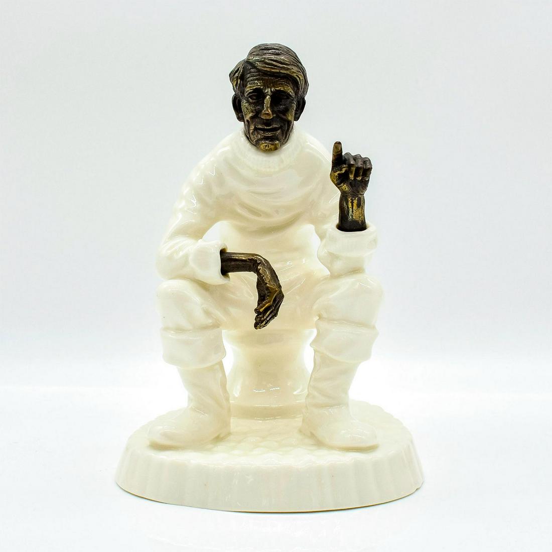 Minton Figurine, Travellers Tales: Cream colored Bone China with bronze face and hands. Modeled as a seated man pointing. Minton backstamp. #minton #figurine Issued: 1978 Dimensions: 7"H Manufacturer: Minton Country of Origin: England