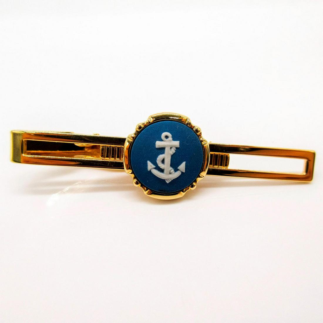 Wedgwood Jasperware Tie Clip, Anchor: Gold toned tie clip with white relief of an anchor on blue Jasperware. Wedgwood incised backstamp. PAT No.2164082. Jasper front face: .5"W. Includes box. #Wedgwood #Jasperware #Tieclip Issued: 20t