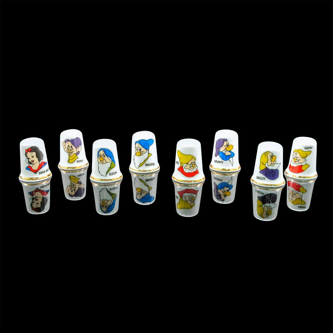8 Stoke on Trent Thimbles, Snow White and The Seven Dwarfs: Glossy fine bona china featuring the characters of 'Snow White and The Seven Dwarfs' with gold detailing. Stoke on Trent backstamp located inside each thimble. #snowwhite #thimbles Issued: 20t