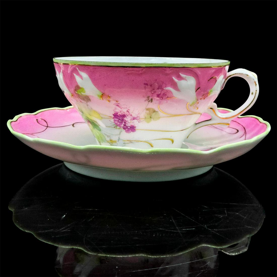 Bauer, Rosenthal & Co. Mustache Tea Cup and Saucer (1 of 4)