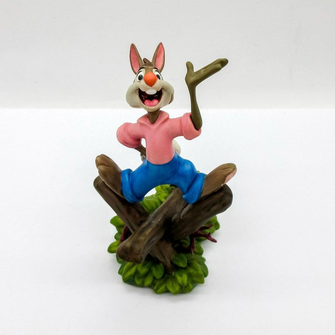 Walt Disney Classics Figurine, Brer Rabbit: Porcelain depiction of Brer Rabbit posed on fallen fence posts. From the Disney film 'Song of the South'. Bottom reads 50th Anniversary, "Born and bred in a briar patch". Walt Disney Classics Collecti