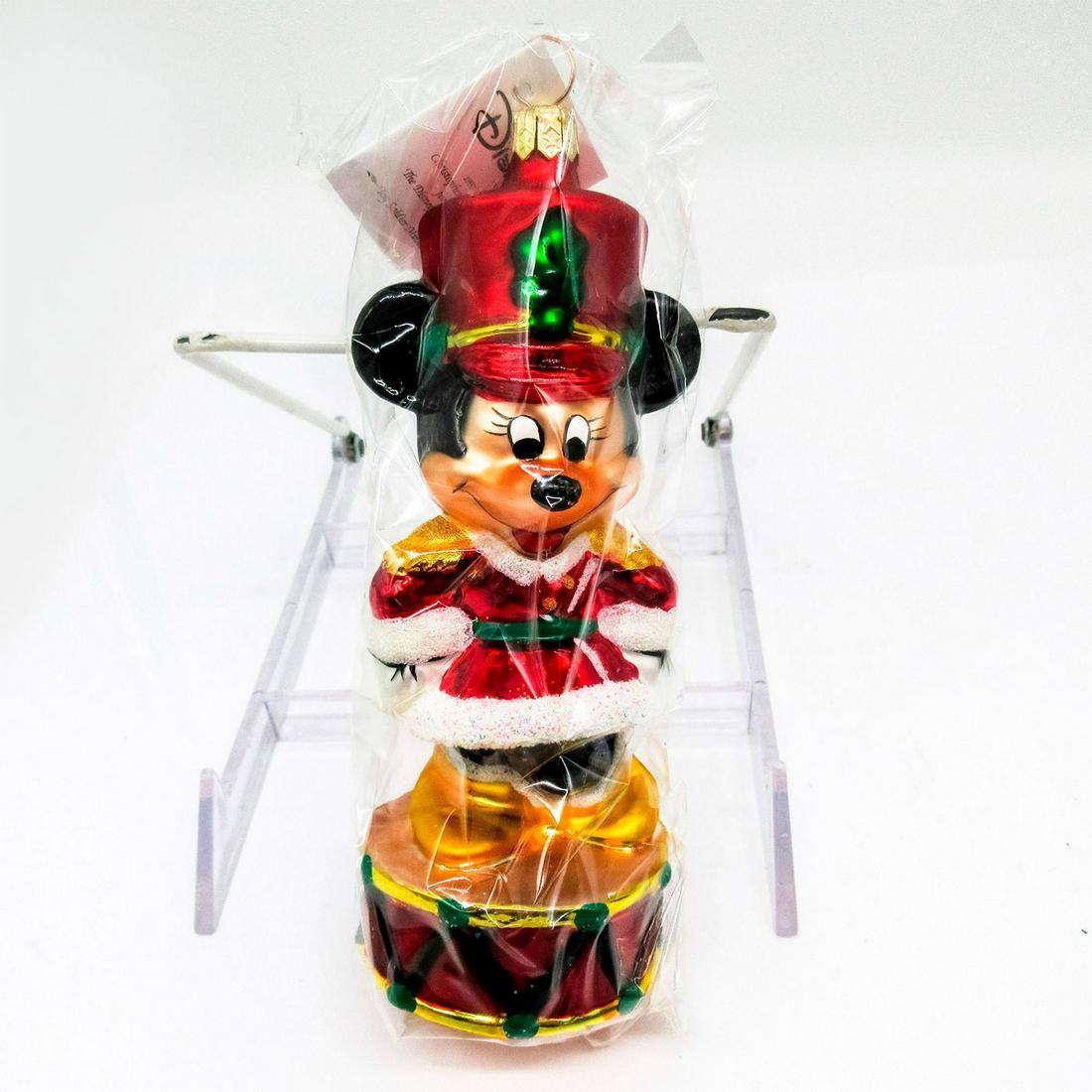 Christopher Radko Disney Ornament, Toy Soldier Minnie: Colorful hand painted glass ornament with glitter accent. Includes hang-tag. In original box, dimensions measure: 8.25"L x 4"W x 2.5"H . Artist: Christopher Radko Issued: 1997 Dimensions: 2.75" W x 6.