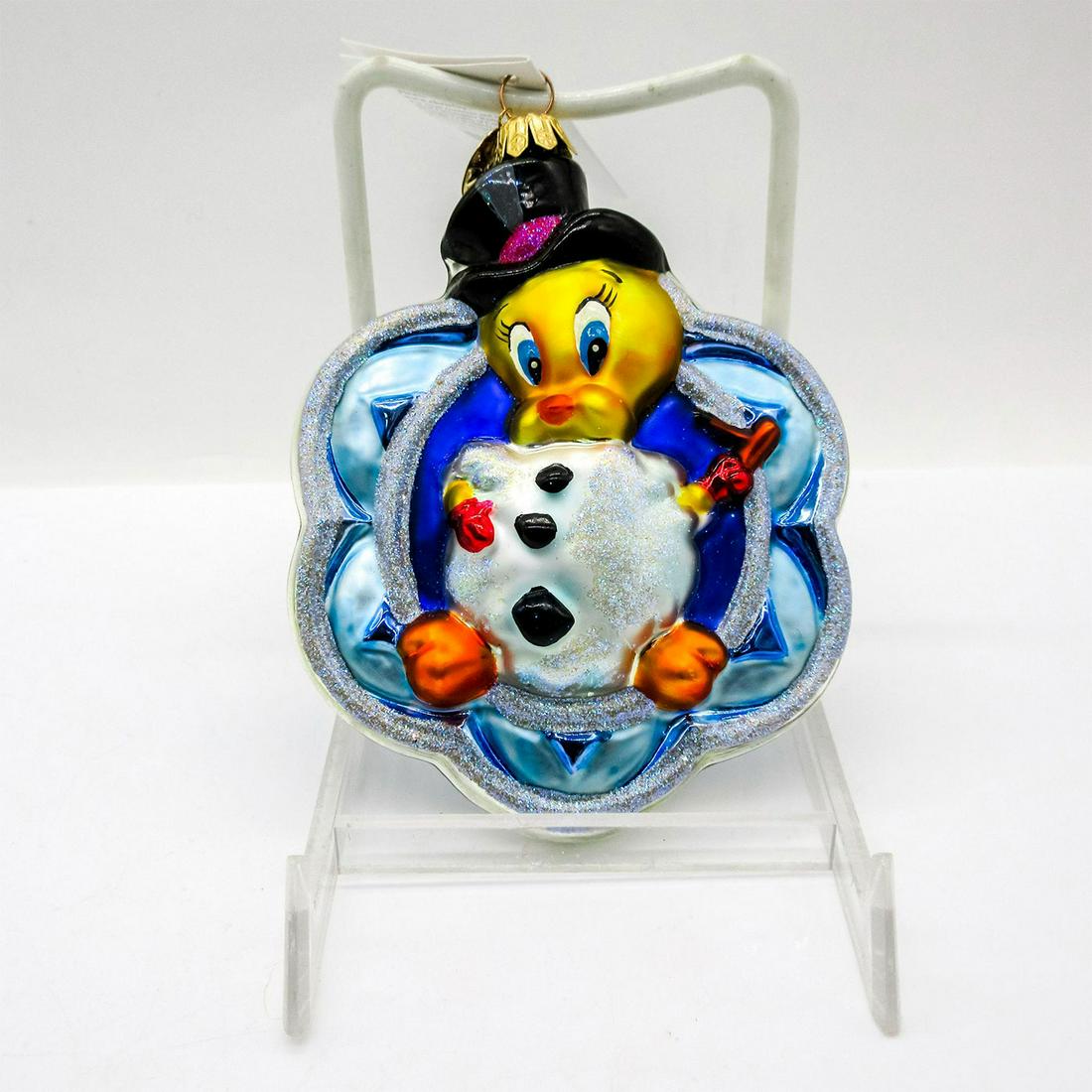 Radko Warner Bros Ornament, Tweety Snowman: Limited edition, colorful hand painted glass ornament with glitter accent. Includes certificate of authenticity. In original box, dimensions measure: 6"L x 5.75"W x 1.75"H . Artist: Poland Issued: 200