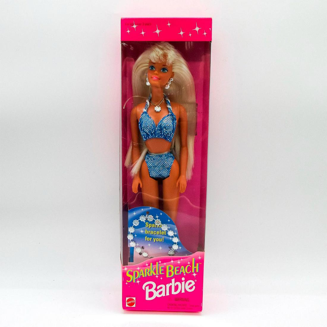 Vintage Mattel Barbie Doll, Sparkle Beach: In original box, unopened. #13132. Original box included. Dimensions of box: 3.75"L x 2"W x 12.75"H. #Barbie #Mattel Issued: 1995 Dimensions: 11.5"H Manufacturer: Malaysia Country of Origin: Mattel
