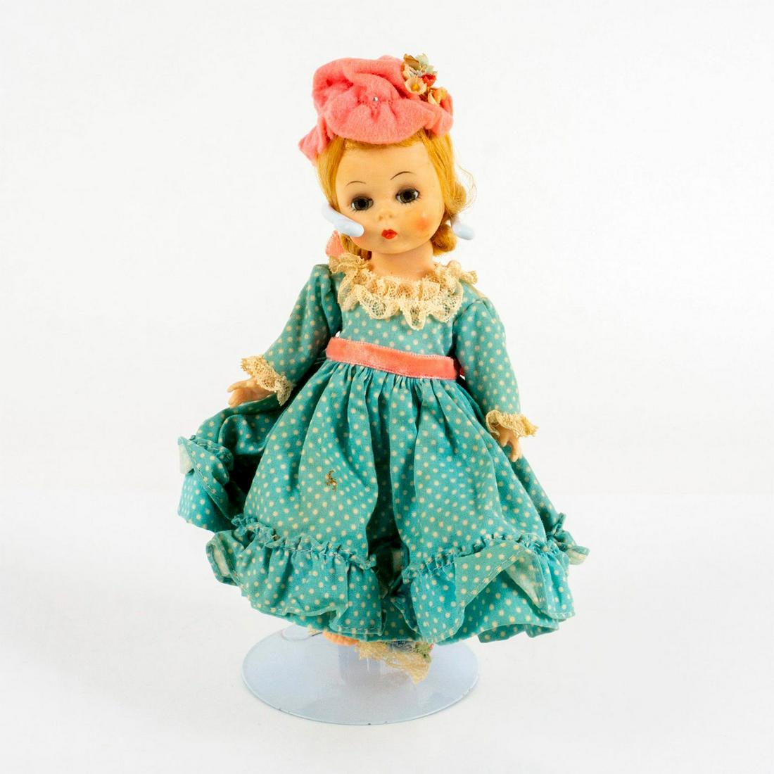 Vintage Madame Alexander Doll: Jointed with moving eyelids. This item has its original box with dimensions of 8.25"L x 5.5"W x 2.75"H. Dimensions: 2" L x 4" W x 8" H Manufacturer: Madame Alexander Country of Origin: United States