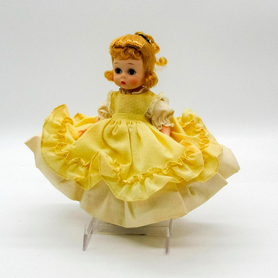 Vintage Madame Alexander Doll, Amy: From Little Women series. Jointed with moving eyelids. This item has its original box. Dimensions of box: 8.25"L x 3.5"W x 8.25"H. Dimensions: 7.25" H Manufacturer: Madame Alexander Country of Origin:
