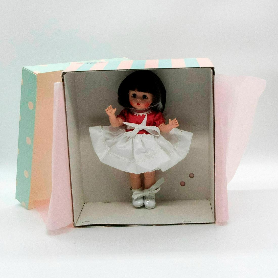 Vintage Madame Alexander Doll, City Shopper Wendy: Jointed with moving eyelids. Includes separate jacket with pearl buttons and white hat. This item has its original box with dimensions of: 8.25"L x 3.5"W x 8.25"H. Dimensions: 7.5" H Manufacturer: Mad