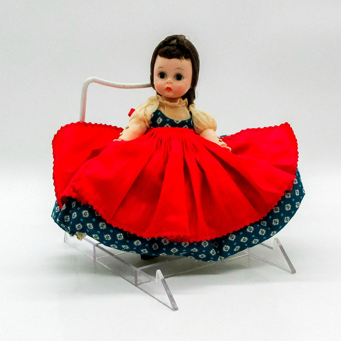 Vintage Madame Alexander Doll, Jo: Jointed with moving eyelids. This item has its original box. Dimensions of box: 8.25"L x 3.5"W x 8.25"H. Dimensions: 7" H Manufacturer: Madame Alexander Country of Origin: United States