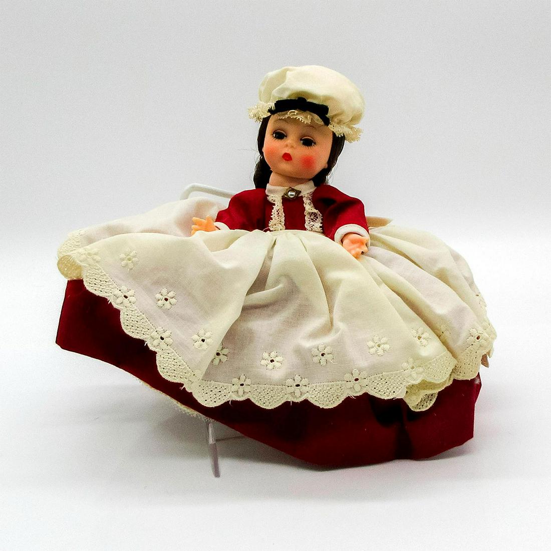 Vintage Madame Alexander Doll, Marme: Jointed with moving eyelids. This item has its original box. Dimensions of box: 8.25"L x 3.5"W x 8.25"H. Dimensions: 7.25" H Manufacturer: Madame Alexander Country of Origin: United States