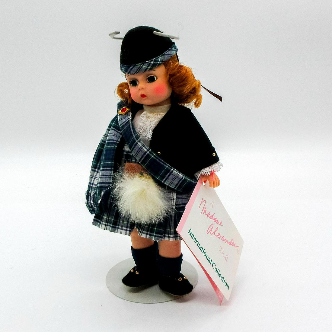 Vintage Madame Alexander Doll, Scotland: International Collection. Jointed with moving eyelids. Includes wrist tag. Dimensions: 8" H Manufacturer: Madame Alexander Country of Origin: United States