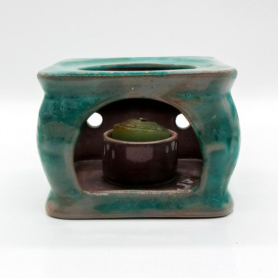 Vintage Stangl Redware Seafoam Green Candle Warmer: Earthenware glazed with small and large cutouts and plate indentation on top. Stangle USA 3412 on bottom of piece. Issued: 20th c. Dimensions: 3.25" H x 4.5" dia. Manufacturer: Stangl Country of Origi