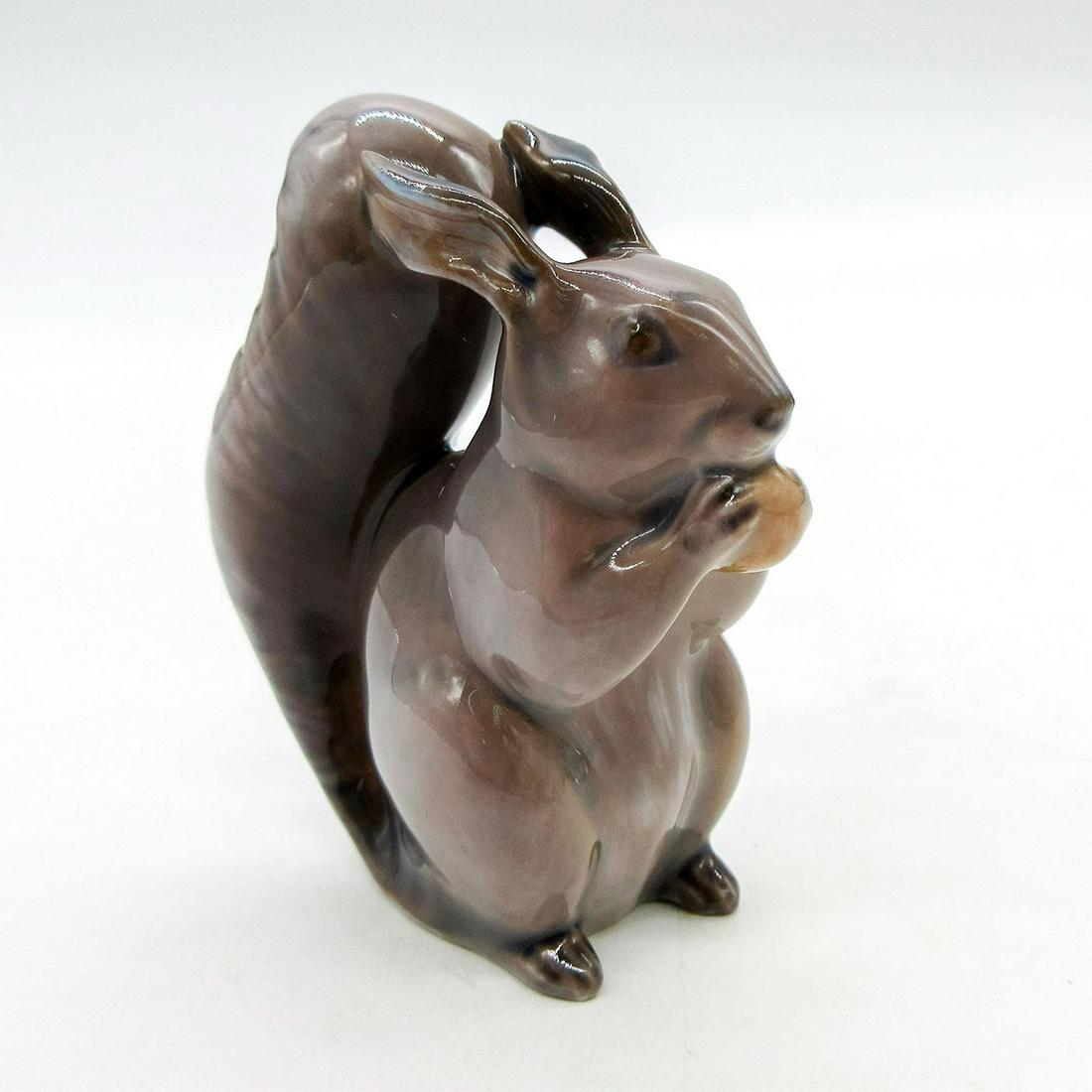 Vintage Royal Copenhagen Figurine, Squirrel with Nut: Glossy Finish. Royal Copenhagen backstamp. Marked 982. Dimensions: 2.75" H Manufacturer: Royal Copenhagen Country of Origin: Denmark