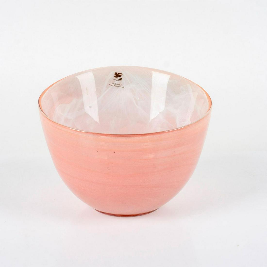 Sea Glasbruk Kosta Sweden Bowl, Pink: Vibrant glass vase in an unusual swirl pattern. Interior is white. In original box 5.5"H x 7"W x 7"L. Issued: 20th c. Dimensions: 6.5" L x 6.75" W x 5.25" H Manufacturer: Orrefors Kosta Bo