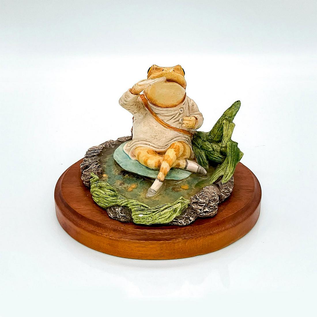 Mr. Jeremy Fisher - Beatrix Potter Figurine: Resin sculpture on wooden base from the tale of Mr. Jeremy Fisher. John Beswick studio sculpture label on base. This item has no reserve. Issued: 1984 Dimensions: 4.25" H Manufacturer: Beswick Country