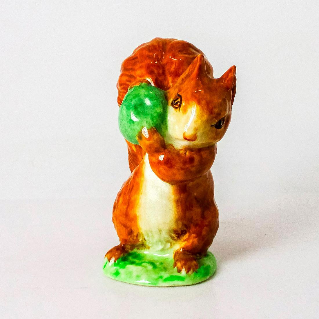 Squirrel Nutkin - Beatrix Potter Figurine: Glossy finish. In brown, green, and white coloration. Beswick and F. Warne & Co. Ltd. backstamps. #Beswick #BeatrixPotter Issued: 20th c. Dimensions: 3.75" H Manufacturer: Beswick Country of Origin: E