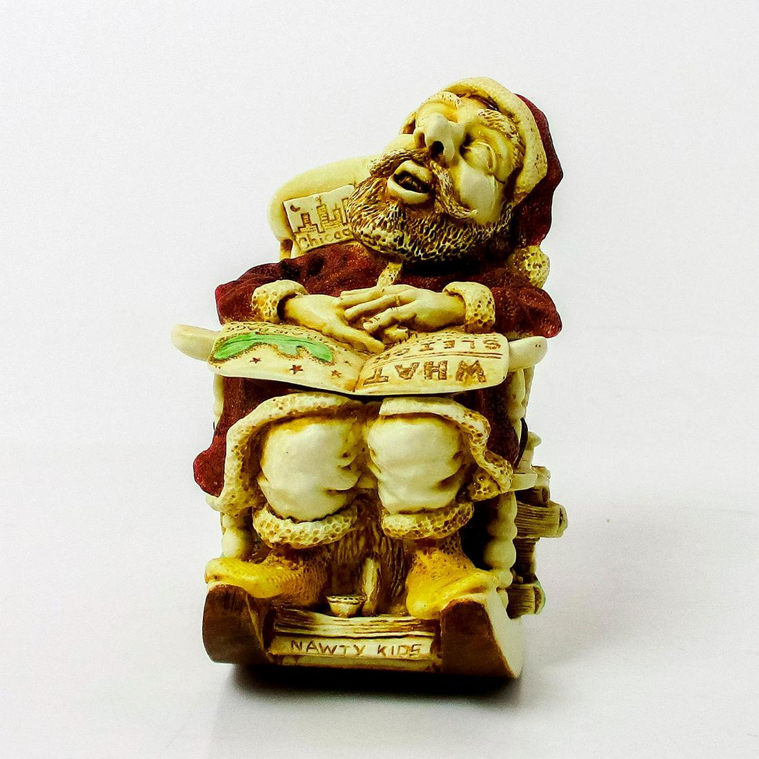 Harmony Kingdom Trinket Box, Jingle Bell Rock: Crushed marble trinket box modeled as Santa asleep in his rocking chair. Harmony Kingdom backstamp. Original box included. 4.75"H x 3.75"D. #HarmonyKingdom Issued: 20th c. Dimensions: 3" H Manufacture
