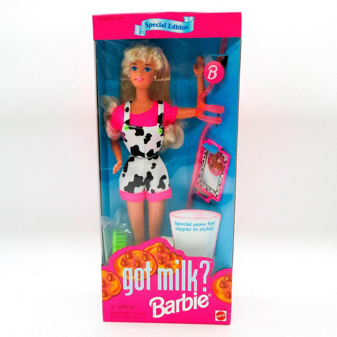 Mattel Barbie Doll, Got Milk?: Features blonde Barbie wearing an adorable pair of shorteralls with cow pattern and hot pink shirt. Special edition. Model number 15121. Includes special pink straw. Comes in unopened original box. 13