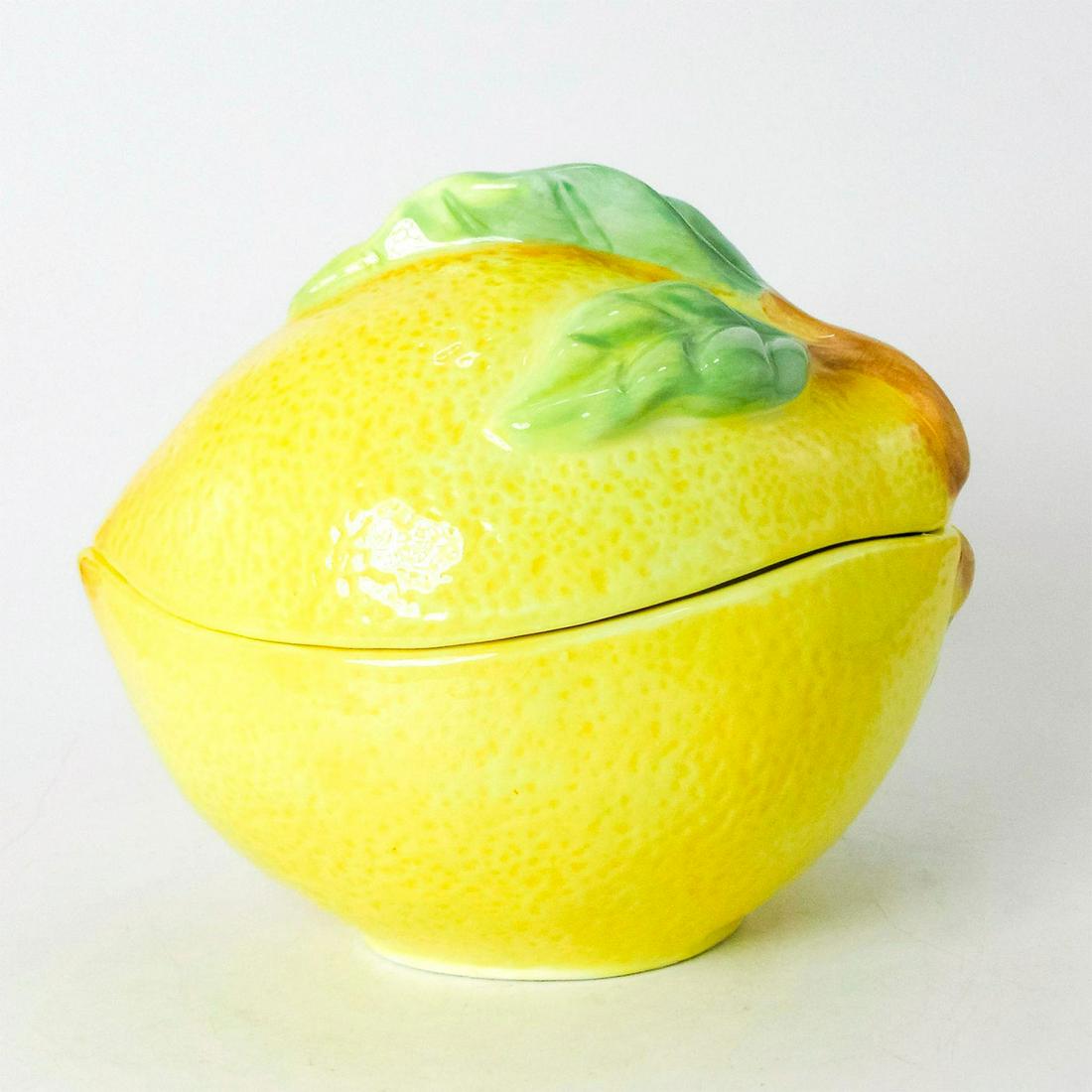 Majolica Large Size Lemon Biscuit Jar, Royal Doulton: An unusual majolica pottery Lemon lidded jar by Royal Doulton. Royal Doulton backstamp. #RoyalDoulton Issued: 2002 Dimensions: 5.5"H Manufacturer: Royal Doulton Country of Origin: England