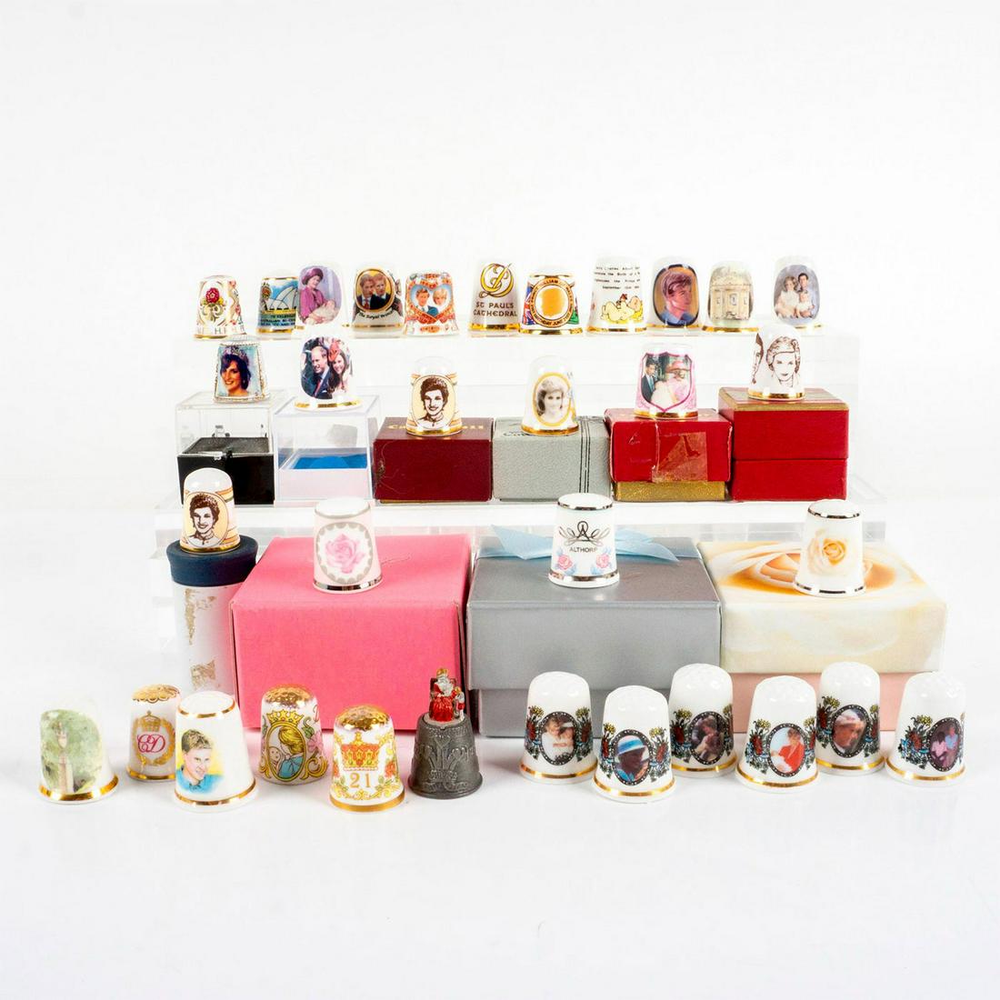33pc Vintage Collectible Royal Family Thimbles: Thimbles honoring the life of Princess Diana and the life events of the royal family. Includes births, birthdays, deaths, anniversaries, and marriages. Includes one thimble honoring the Duke and Duche