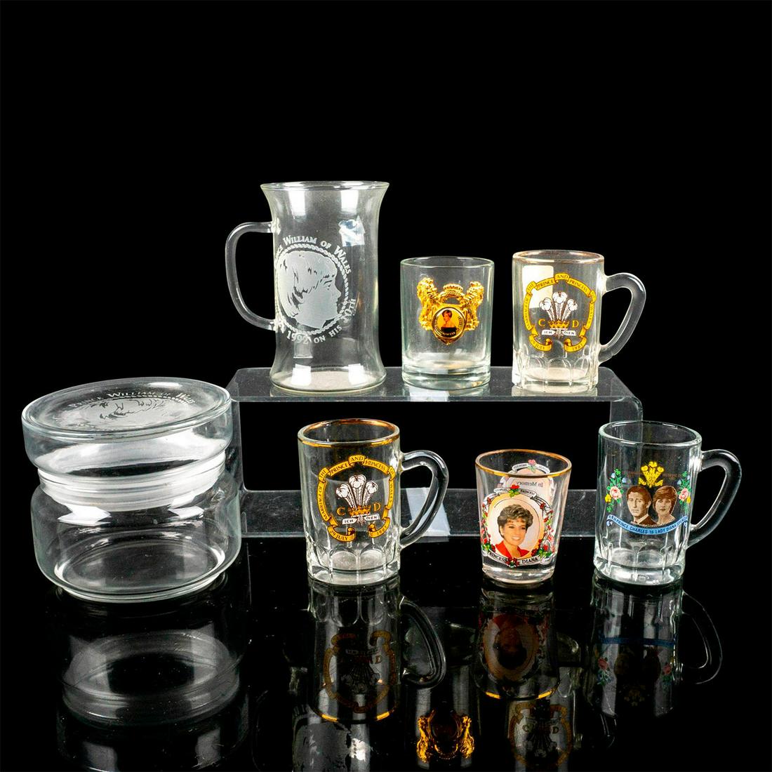 7pc Commemorative Souvenir Glassware, Diana & Family: Includes 2 shot glasses, 4 mini mugs, and a canister. Commemorates Prince William's 10th birthday, and Diana & Charles' marriage. Largest measures 4.5"H. Country of Origin: China