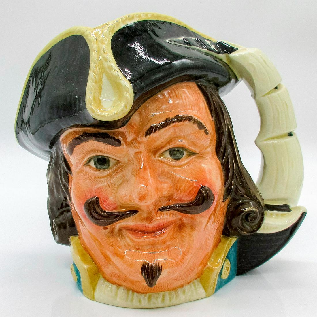 Capt Henry Morgan D6467 - Large - Royal Doulton Character Jug: Glazed, hand painted ceramic. The captain is in a black tricorn, blue collar trimmed with gold. The handle is a sails of a ship. Royal Doulton backstamp. Artist: Garry Sharpe Issued: 1958 - 1982 Dimen