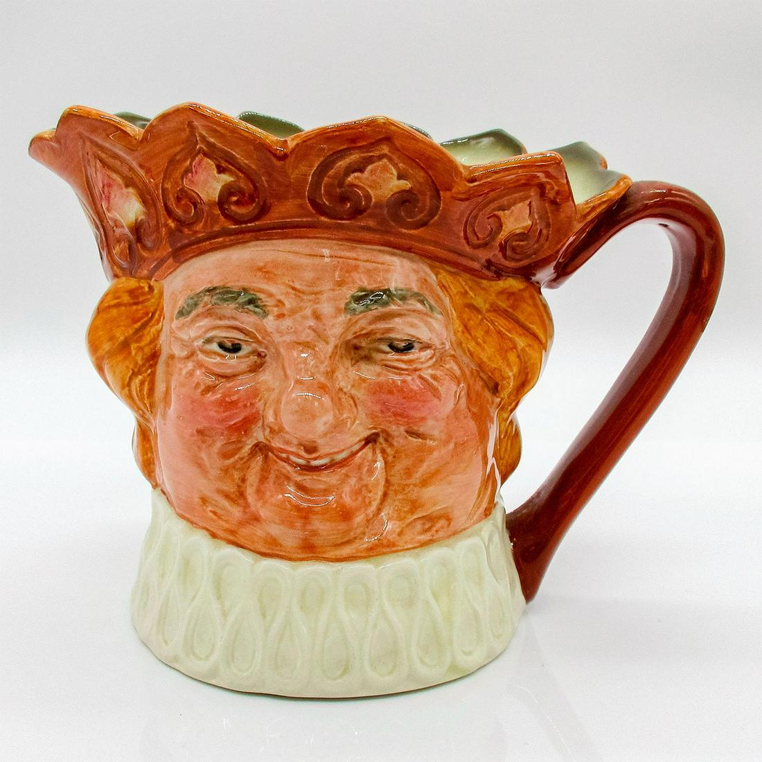 Old King Cole D6036 - Large - Royal Doulton Character Jug: Glazed, hand painted ceramic. Variation Two. Old King with brown crown, frills in the white ruff are deep and pronounced. Royal Doulton backstamp. Artist: Harry Fenton Issued: 1939 - 1960 Dimensions: