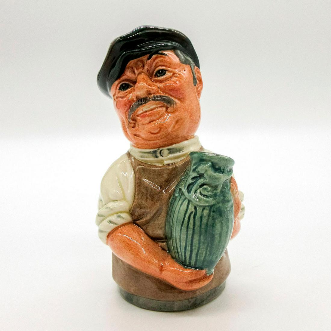 Albert Sagger D6745 - Royal Doulton Toby Jug: Brown apron; white shirt; dark green cap; light green vase. Series: The Doultonville Collection; RDICC. Royal Doulton backstamp. Artist: William K. Harper Issued: 1986 - 1986 Dimensions: 4"H Manufactu