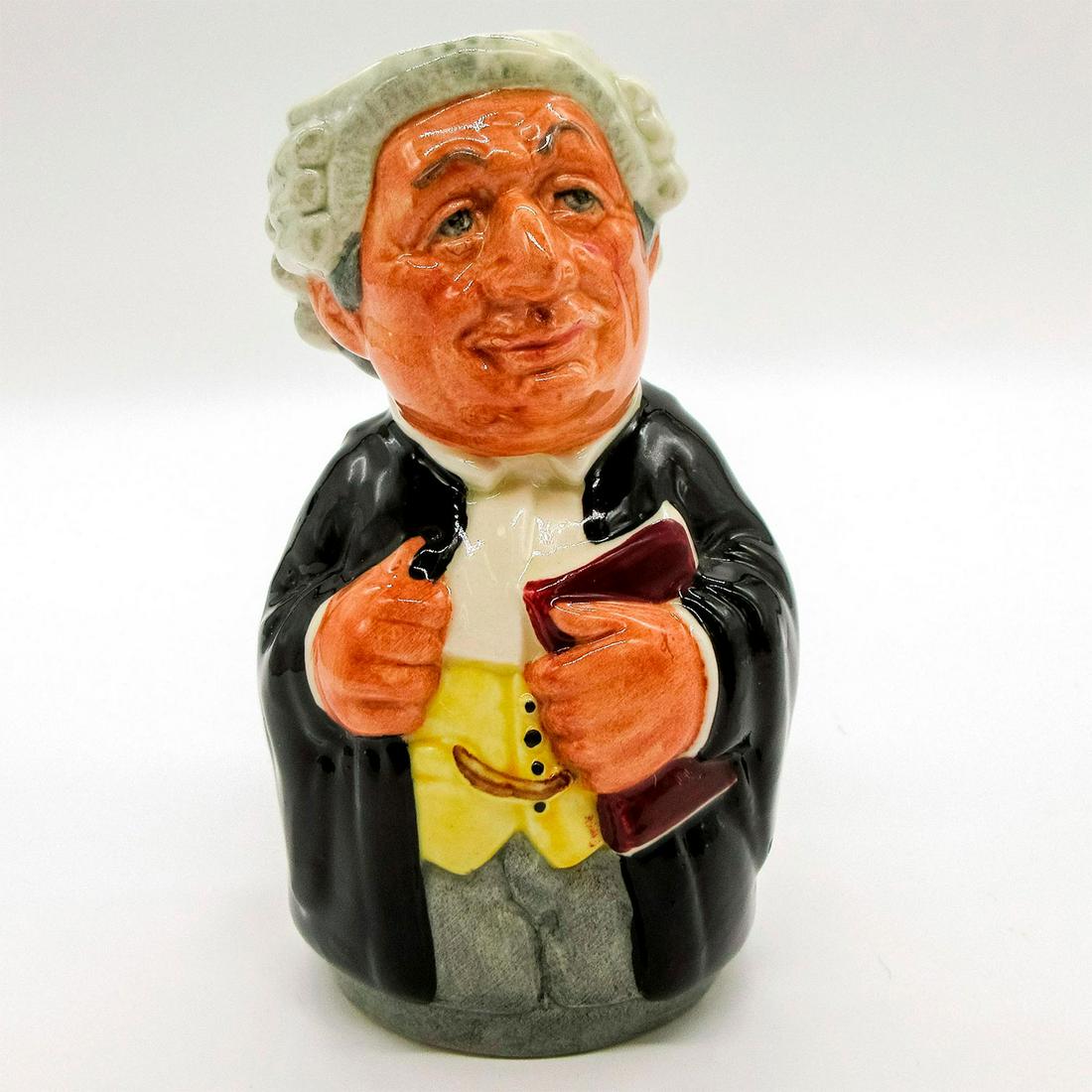 Mr. Litigate the Lawyer D6699 - Royal Doulton Toby Jug: Black robes; yellow waistcoat; grey wig and trousers. Series: The Doultonville Collection. Royal Doulton backstamp. Artist: William K. Harper Issued: 1983 - 1991 Dimensions: 4''H Manufacturer: Royal D