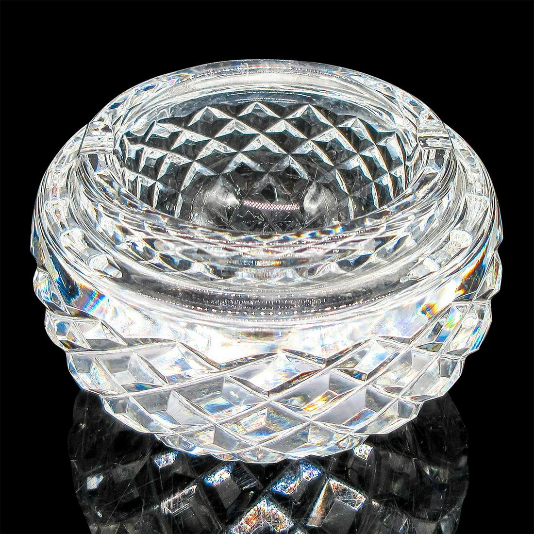 Waterford Crystal Round Ashtray: Clear with cut crystal pattern throughout. Waterford acid mark. Dimensions: 2" H x 3.5" dia. Manufacturer: Waterford