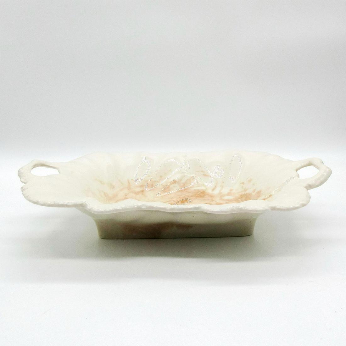 Spode Cream Colored Two Handled Scalloped Edge Serving Tray: Well made piece with square bottom and sides extending upwardly and outwardly like a flower bloom. Vintage. Natural patina from age and use. Spode backstamp on bottom of piece. Dimensions: 11.75" L x 