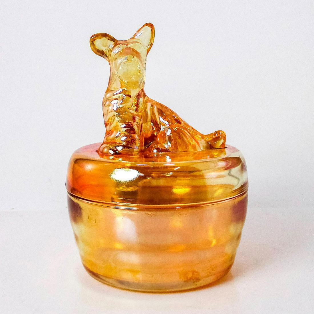 Jeannette Glass Covered Trinket Dish, Scottish Terrier: Iridescent with marigold coloration. Lid is topped with dog figure. #JeannetteGlass #Vintage Issued: c. 1930s-1950s Dimensions: 5.5"H Manufacturer: Jeannette Glass