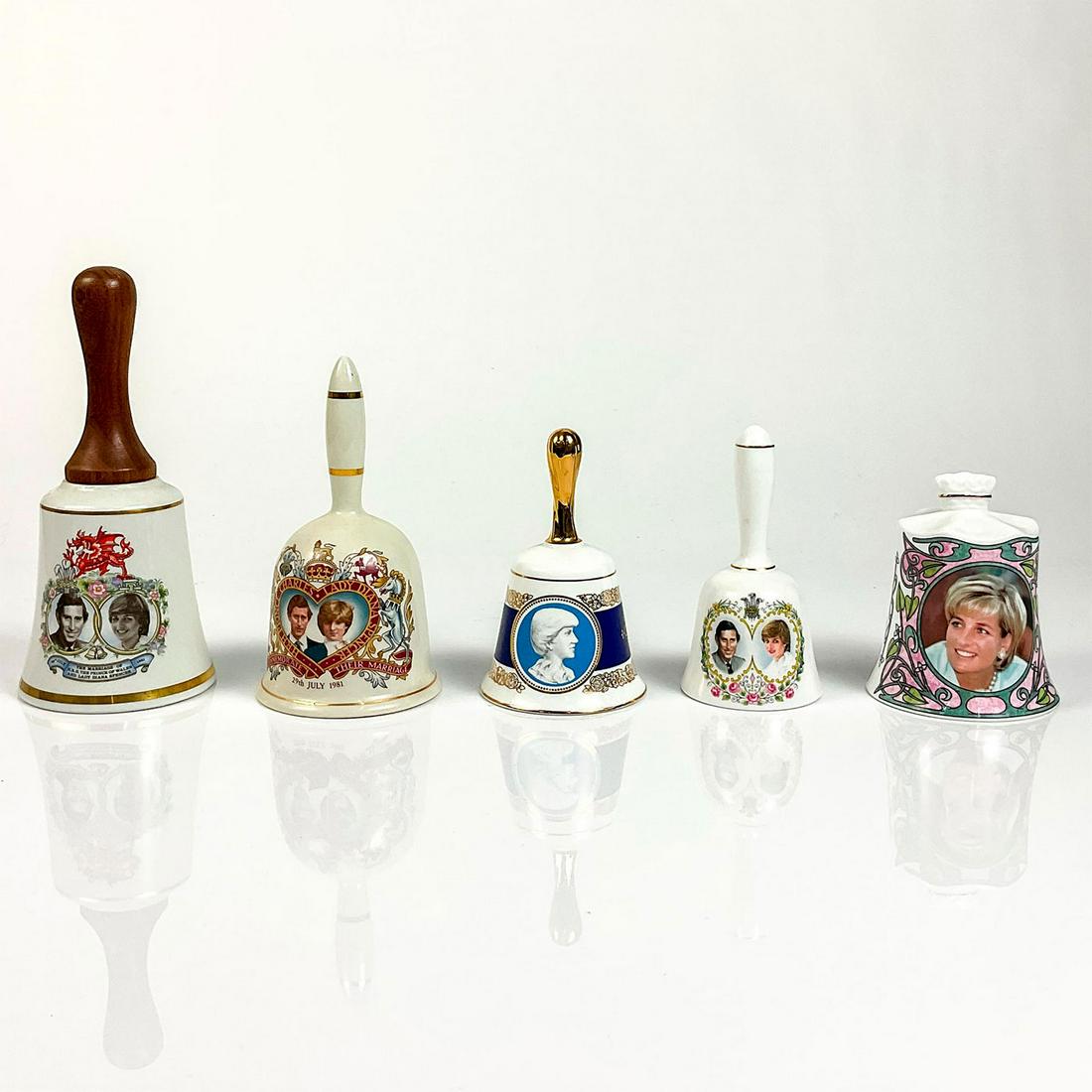 5pc Vintage Prince and Princess of Wales Bells: Four bells commemorating Princess Diana and Prince Charles' wedding. One bell honoring the memory of Princess Diana. Limited editions. Maker's mark stamped to bases. Tallest bell 8"H. Issued: 20th c.