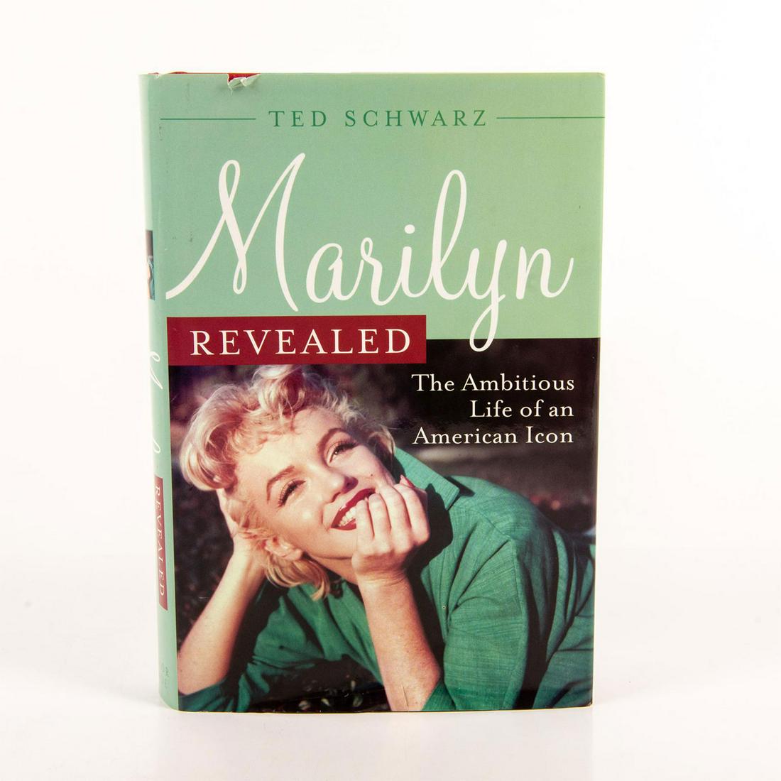 Book, Marilyn Revealed, Ambitious Life Of An American Icon: A comprehensive biography of the life of Marilyn Monroe by Ted Schwarz. Hardcover; dust jacket features Marilyn; 675 pages. Published by Taylor Trade Publishing. Wear to jacket. Issued: 2009 Dimension