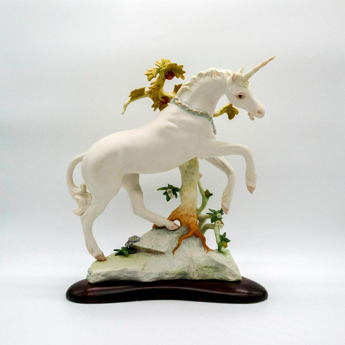 Vintage Cybis Porcelain Sculpture, Unicorn 292: A majestic matte figure on a wooden base. A white unicorn with a blue and gilded collar. Cybis red mark on the back. This item has no reserve. Dimensions: 6.5" L x 11" W x 13" H Manufacturer: Cybis Co