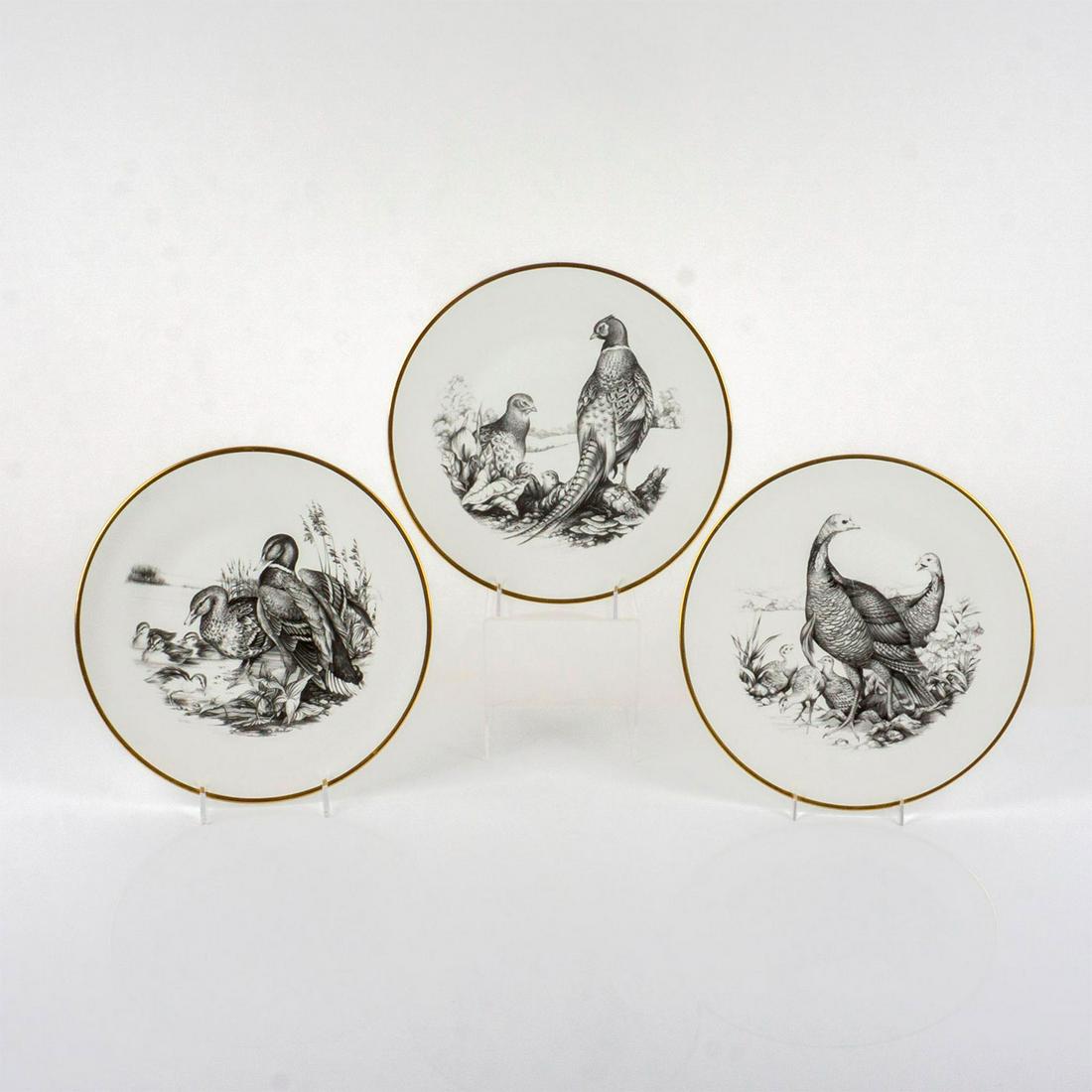 3pc Vintage Boehm Game Bird Series Cabinet Plates: Illustrations of a wild turkeys, mallards, and ring necked pheasants; on white fine bone china with gilded gold trim. Boehm backstamps. This item has no reserve. Dimensions: 0.75"W x 10.75"dia. Manufa