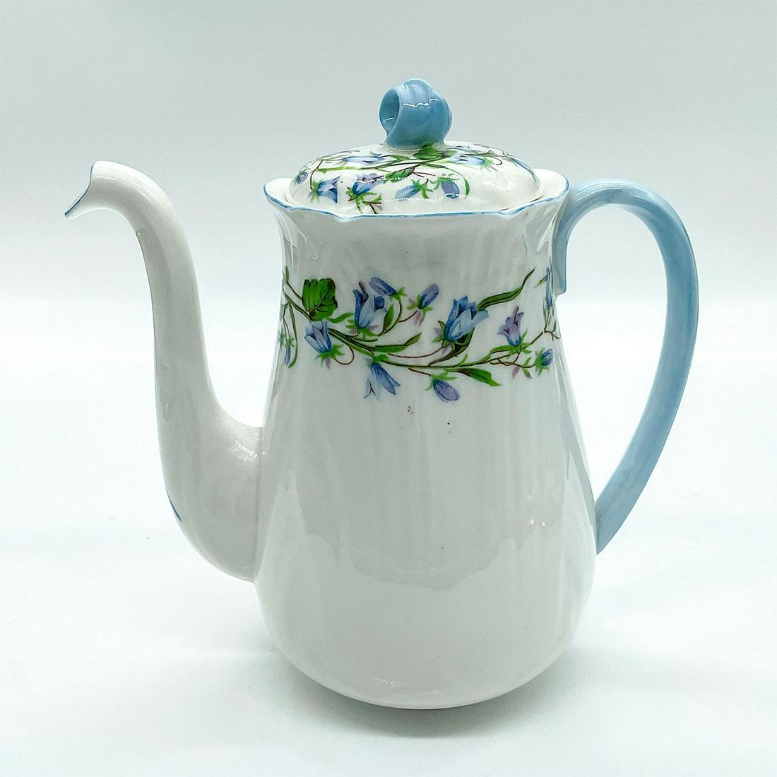 Antique Shelley Harebell, Lidded Coffee Pot: Dainty shaped bone china with a blue floral pattern on lid and pot. Shelley England backstamp on base. This item has no reserve. Dimensions: 6.5" W x 8" H x 2.5" dia. Manufacturer: Shelley Country of