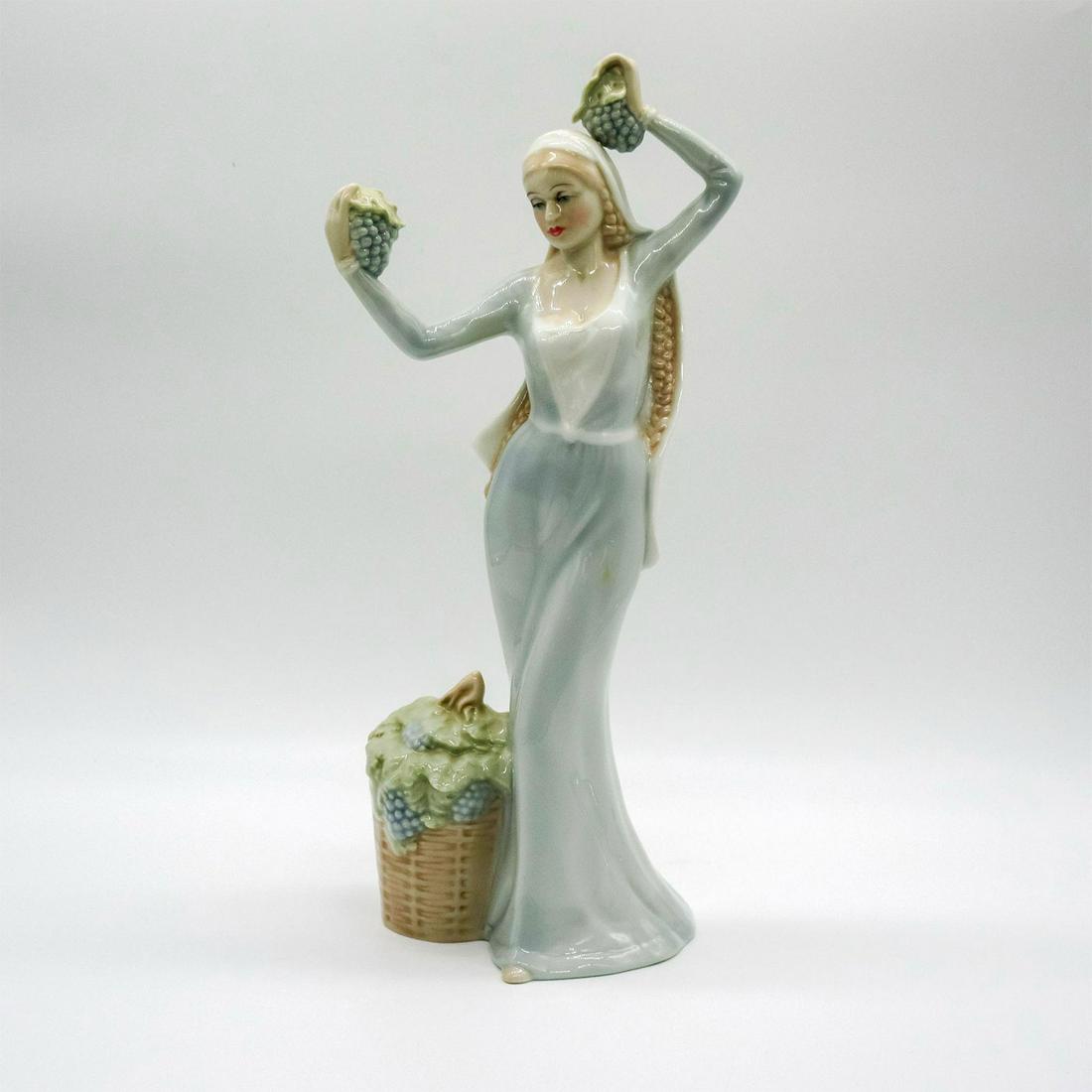 Autumn Glory - HN2766 - Royal Doulton Figurine: Artist: William K. Harper Issued: 1988 Dimensions: 11.75"H Country of Origin: England