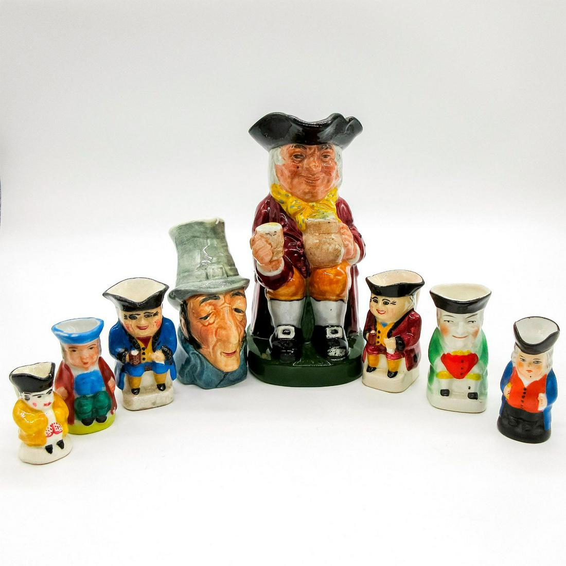 8pc Toby & Character Jug Set: Glazed, in various sizes and colorations. Includes seven tobies and one character jug. Approximate heights range from 1.5"H-5.25"H. #TobyJug #CharacterJug Issued: 20th c.