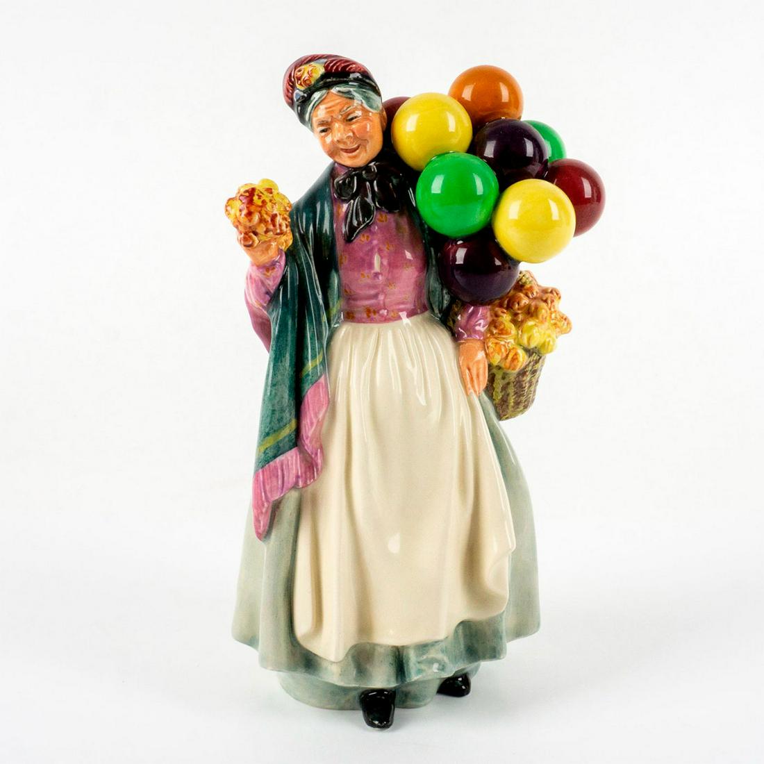 Biddy Penny Farthing - HN1843 - Royal Doulton Figurine: Artist: Leslie Harradine Issued: 1938 - 2009 Dimensions: 9"H Manufacturer: Royal Doulton Country of Origin: England