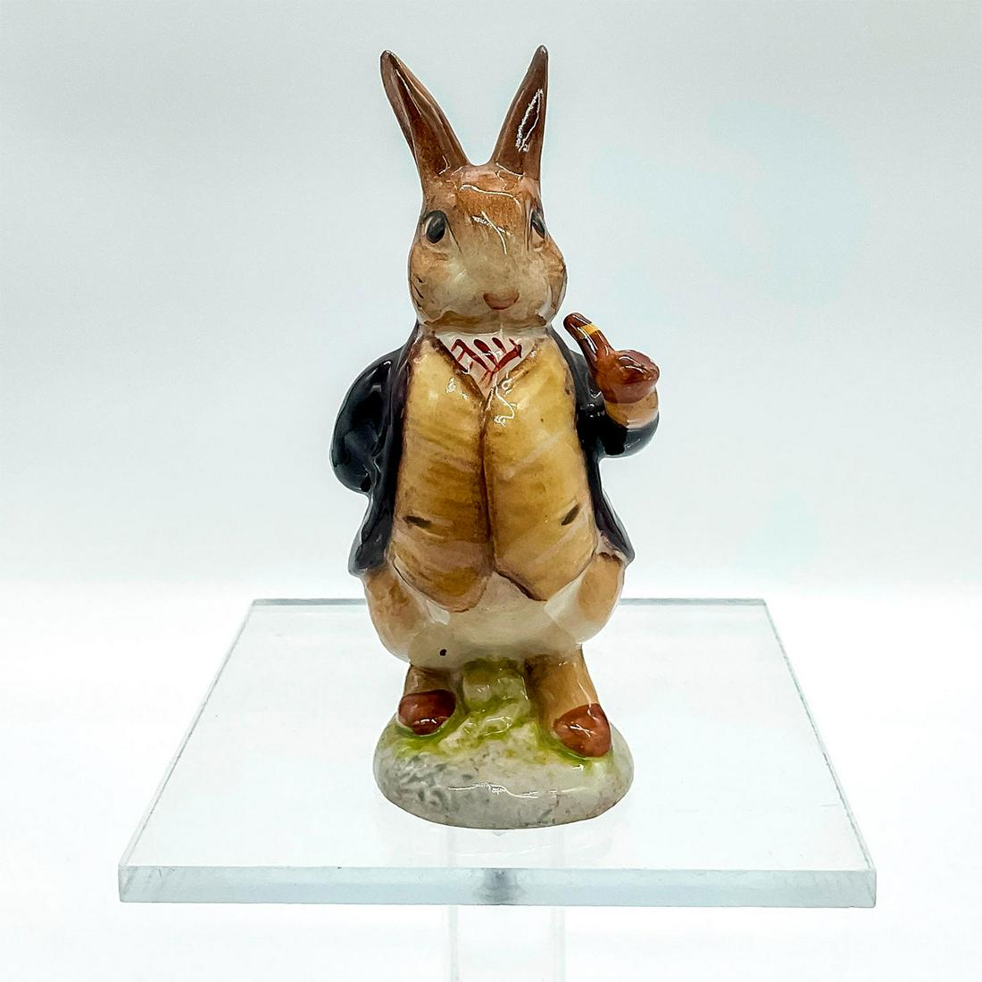 Mr. Benjamin Bunny - Beswick - Beatrix Potter Figurine: Pipe out and maroon jacket. Small size porcelain hand painted in glossy finish. Beswick backstamp. This item has no reserve. Issued: C. 1970 Dimensions: 2.25" W x 4.5" H x 1.75" Diameter Manufacturer: