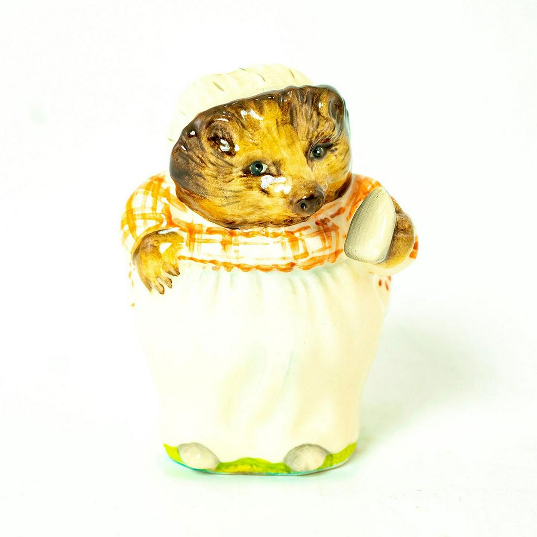 Mrs. Tiggy Winkle - Royal Albert - Beatrix Potter Figurine: Royal Albert Backstamp. Diagonal striped red- brown and white dress, green and blue striped skirt, white apron. Artist: Arthur Gredington Issued: 1948- 1974 Dimensions: 3.25''H Manufacturer: Beswick C