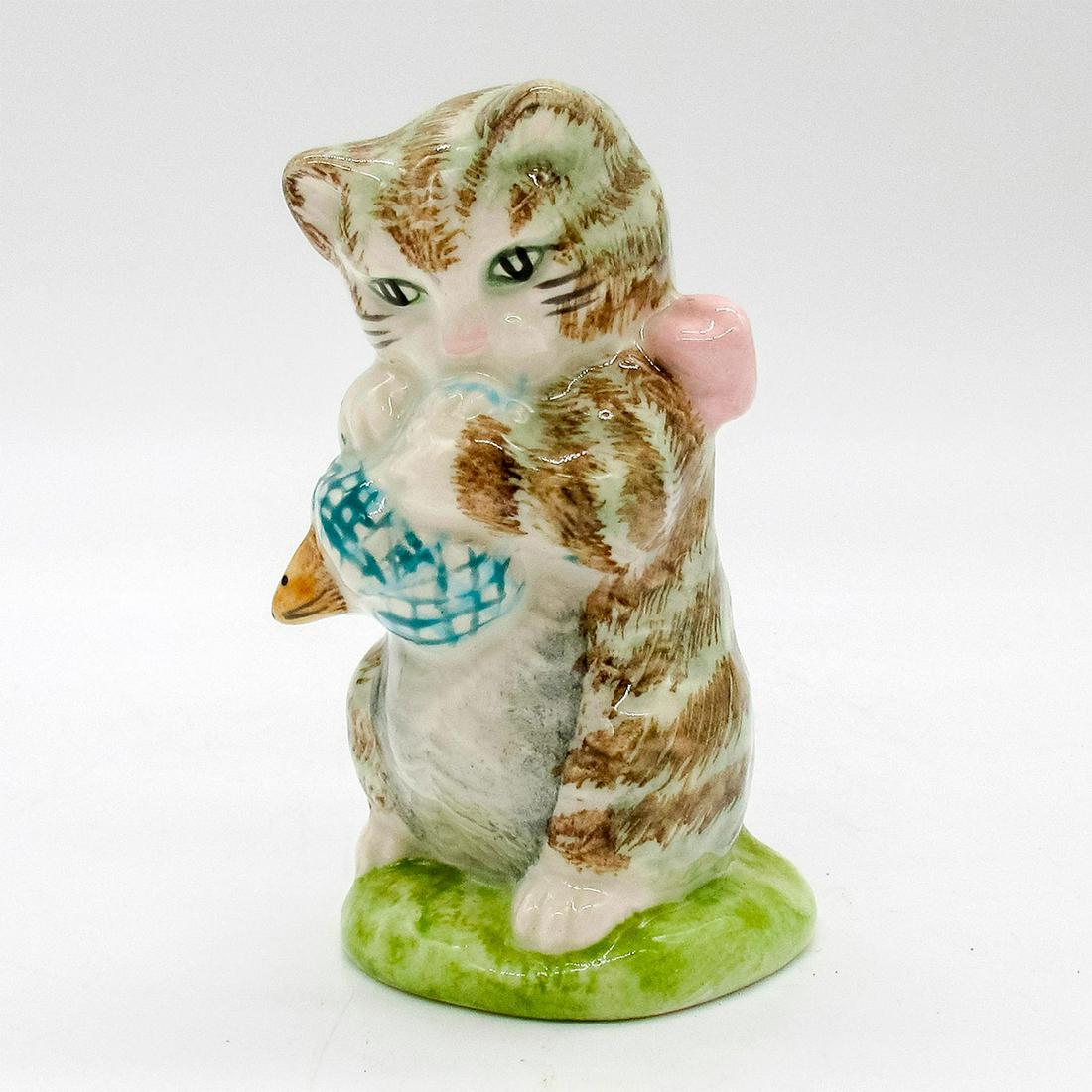 Miss Moppet - Beatrix Potter Figurine: Brown tabby cat with pink bow holding a sack with mouse poking out. Porcelain with glossy finish. Beswick and F. Warne & Co Ltd. backstamps. This item has no reserve. Issued: 1954 Dimensions: 3.25" H