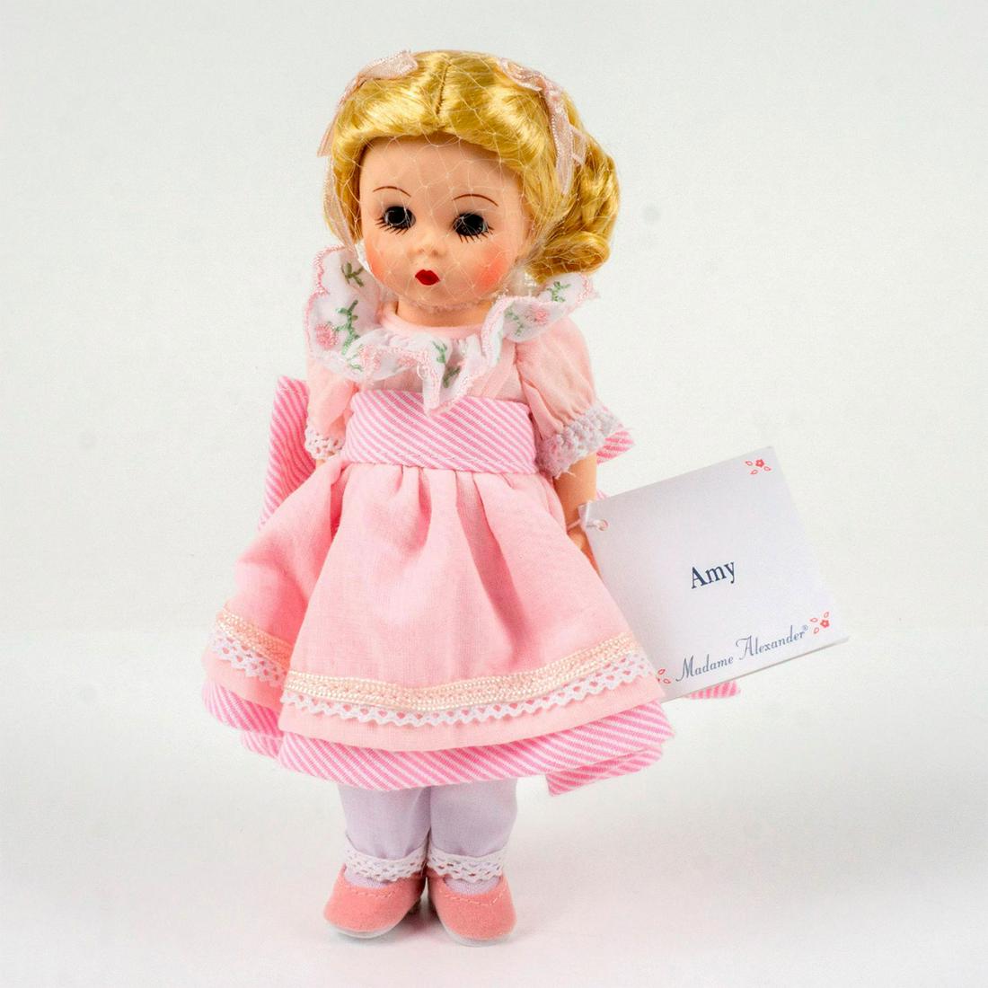 Vintage Madame Alexander Doll, Amy: Jointed with moving eyelids. #50900. Includes original box. Dimensions of box: 8.75"L x 2.75"W x 5.25"H. This item has no reserve. Dimensions: 7.5"H Manufacturer: Madame Alexander Country of Origin: C