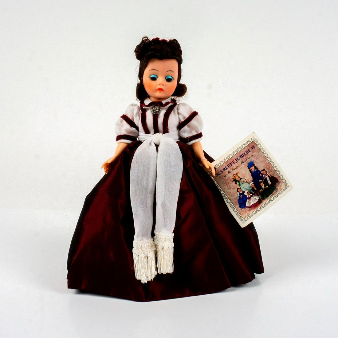 Vintage Madame Alexander Doll, Scarlett: Jointed with moving eyelids. #1100. Includes original box. Dimensions of box: 10.5"L x 3.5"W x 10.25"H. This item has no reserve. Dimensions: 8.5"H Manufacturer: Madame Alexander Country of Origin: Ch