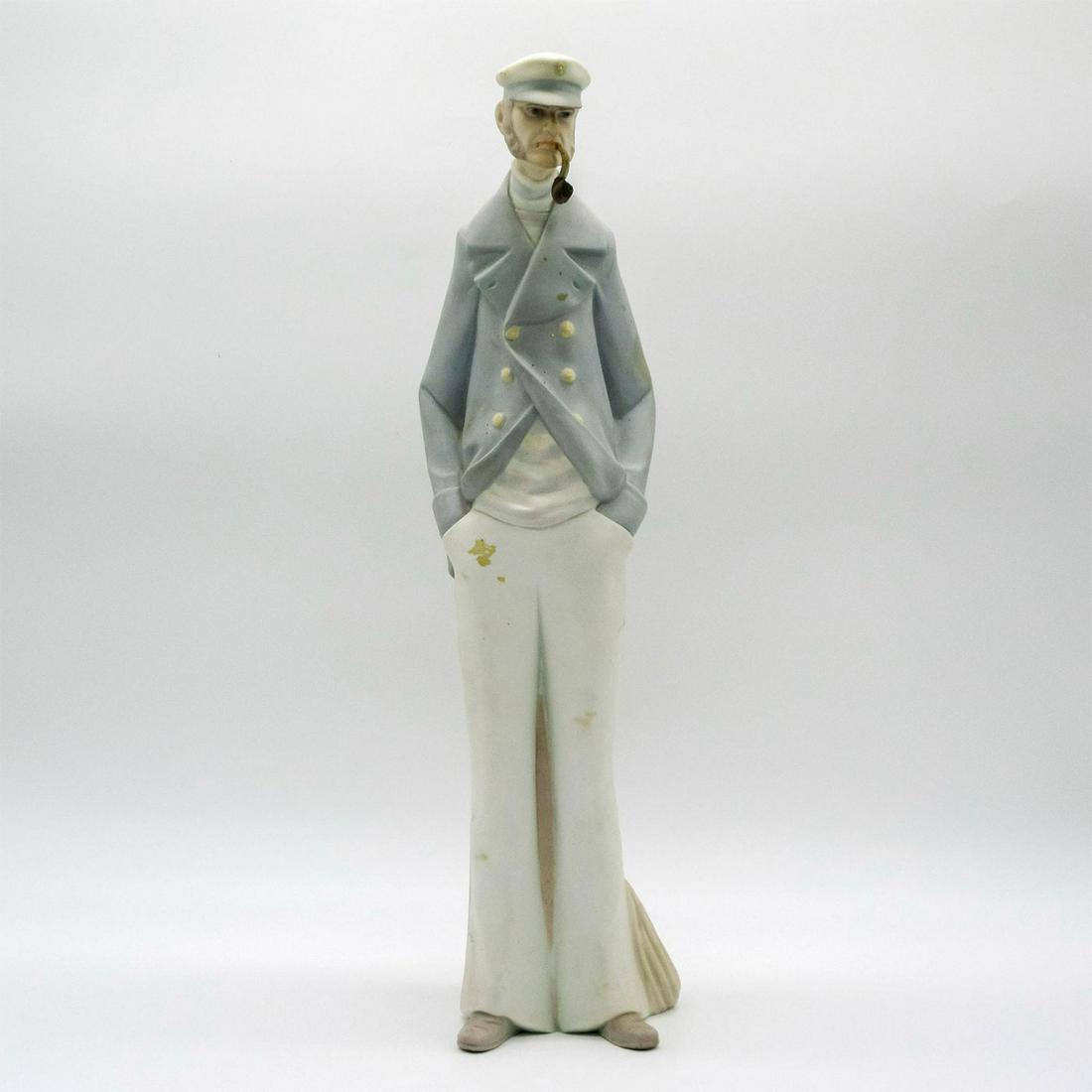 Sea Captain 1014621 - Lladro Porcelain Figurine: Matte finish; Lladro backstamp. Artist: Salvador Furio Issued: 1969 - 1991 Dimensions: 14.5"H Manufacturer: Lladro Country of Origin: Spain