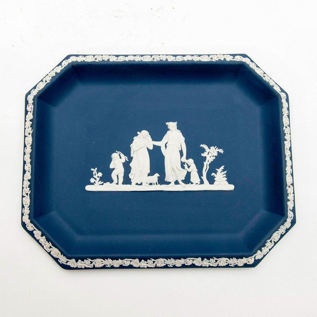 20th c. Wedgwood Jasperware Tray, Offering to Peace: Decorated with grape vine sprigging and classical motif in relief. Wedgwood impressed backstamp. Dimensions: 10.5"L x 8.25"W x 1"H Manufacturer: Wedgwood Country of Origin: England