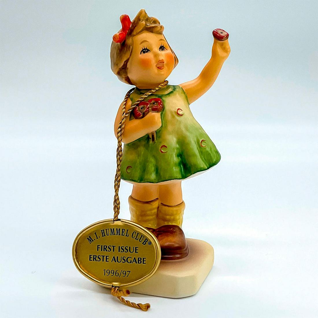 Goebel Hummel Figurine, Forever Yours: Porcelain hand painted in matte finish with hang tag. Goebel backstamp. Impressed M. I. Hummel to square base. Artist: M. I. Hummel Issued: 1996 - 1997 Dimensions: 1.5"L x 1.75"W x 4.25"H Manufacturer