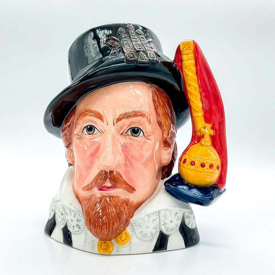 King James I D7181 - Large - Royal Doulton Character Jug: Black, white, yellow, and red coloration. This jug was issued to commemorate the 400th anniversary of the death of James I.Series: Royalty, issued 2003 in a limited edition of 1,000. Royal Doulton bac